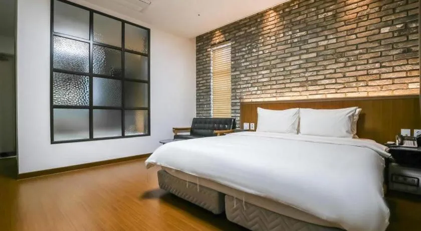 Bed in Hotel Morning Calm