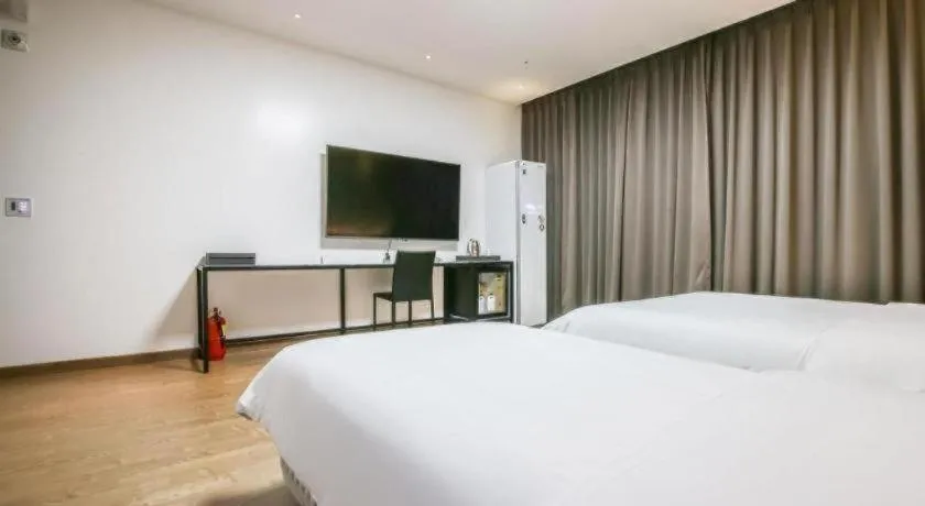 Bed in Hotel Morning Calm