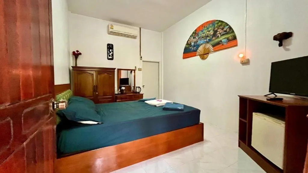 Bed in Sanook Sanang Resort