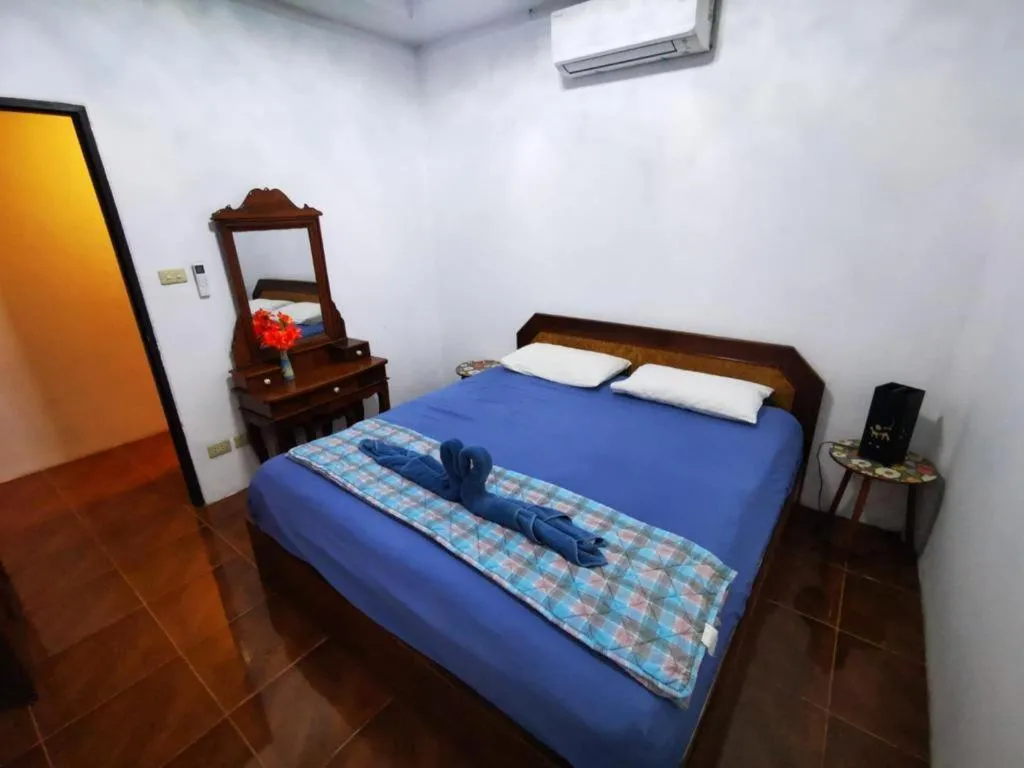 Bed in Sanook Sanang Resort