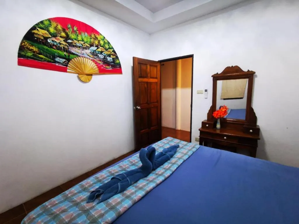 Bed in Sanook Sanang Resort