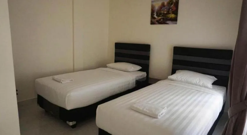 Bed in The Garden Hotel