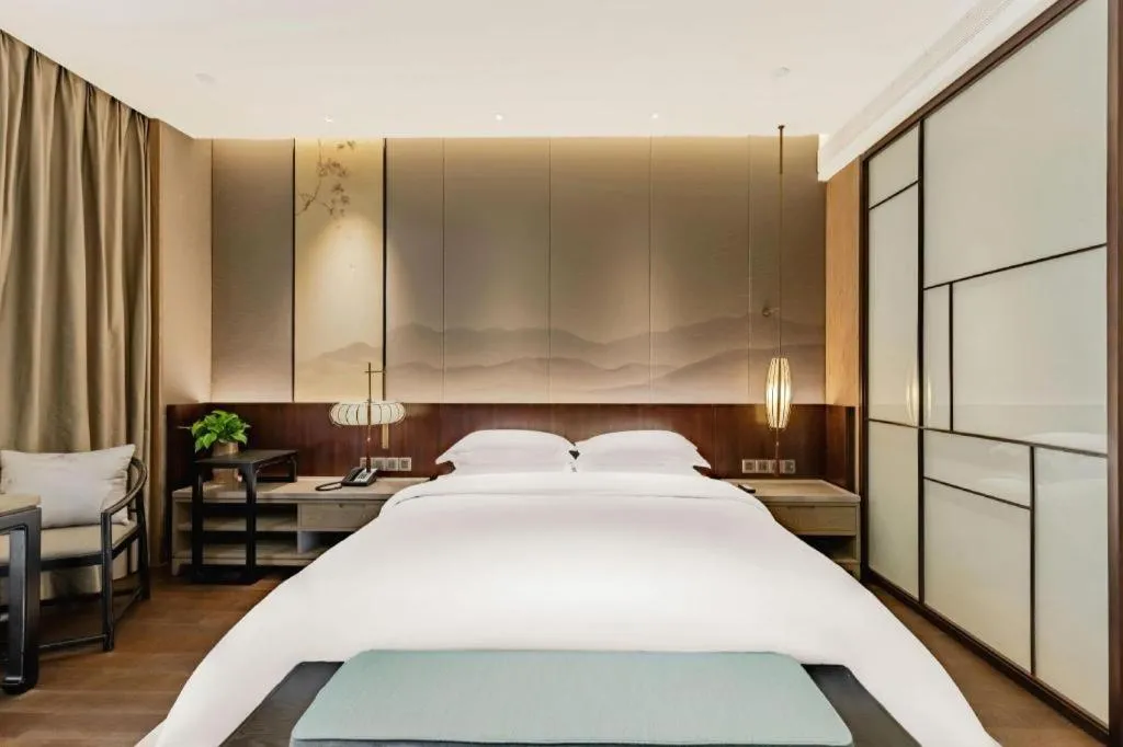 Bed in Wuxi Shanse Hotel