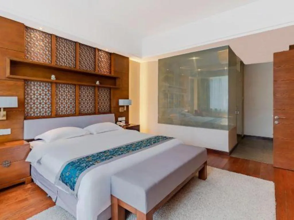 Bed in Wuxi Shanse Hotel