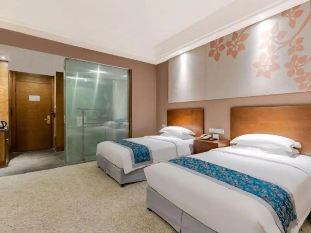 Bed in Wuxi Shanse Hotel