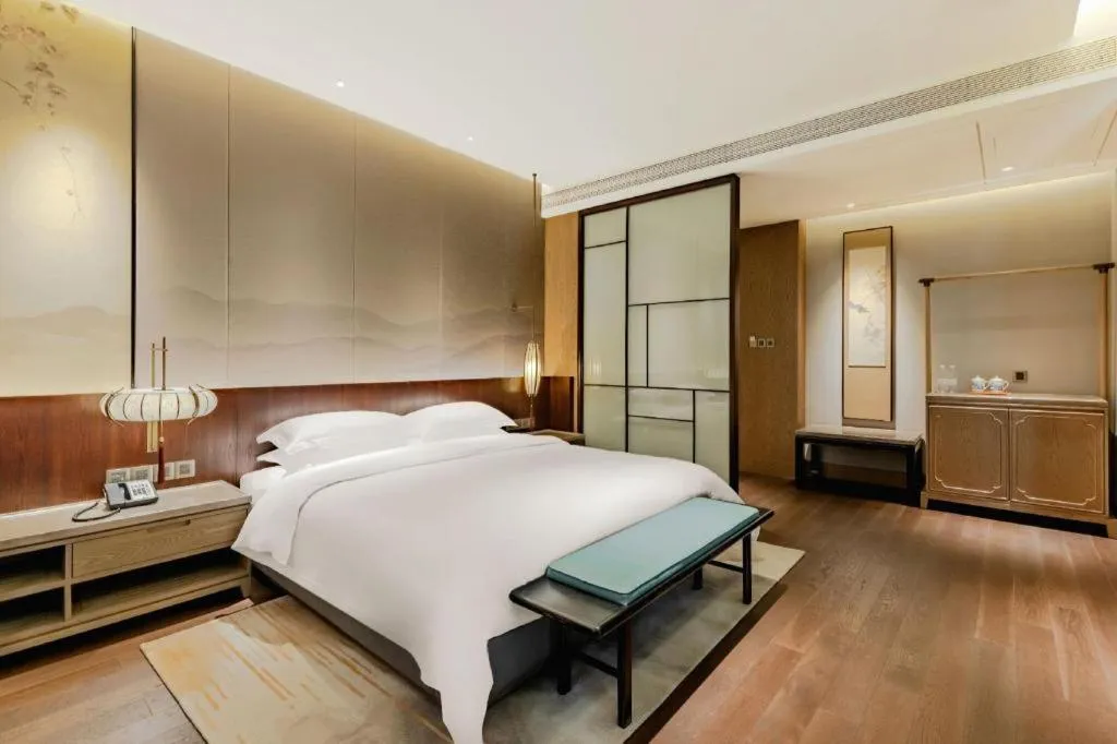 Bed in Wuxi Shanse Hotel