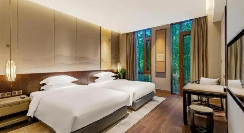 Bed in Wuxi Shanse Hotel