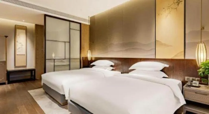 Bed in Wuxi Shanse Hotel