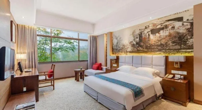 Bed in Wuxi Shanse Hotel