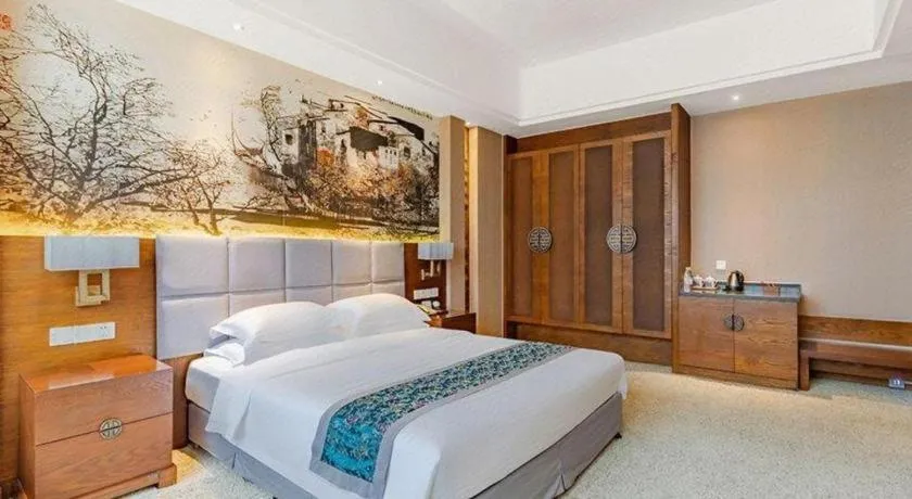 Bed in Wuxi Shanse Hotel