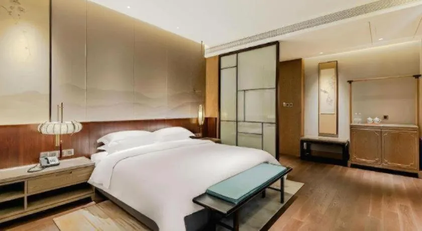 Bed in Wuxi Shanse Hotel