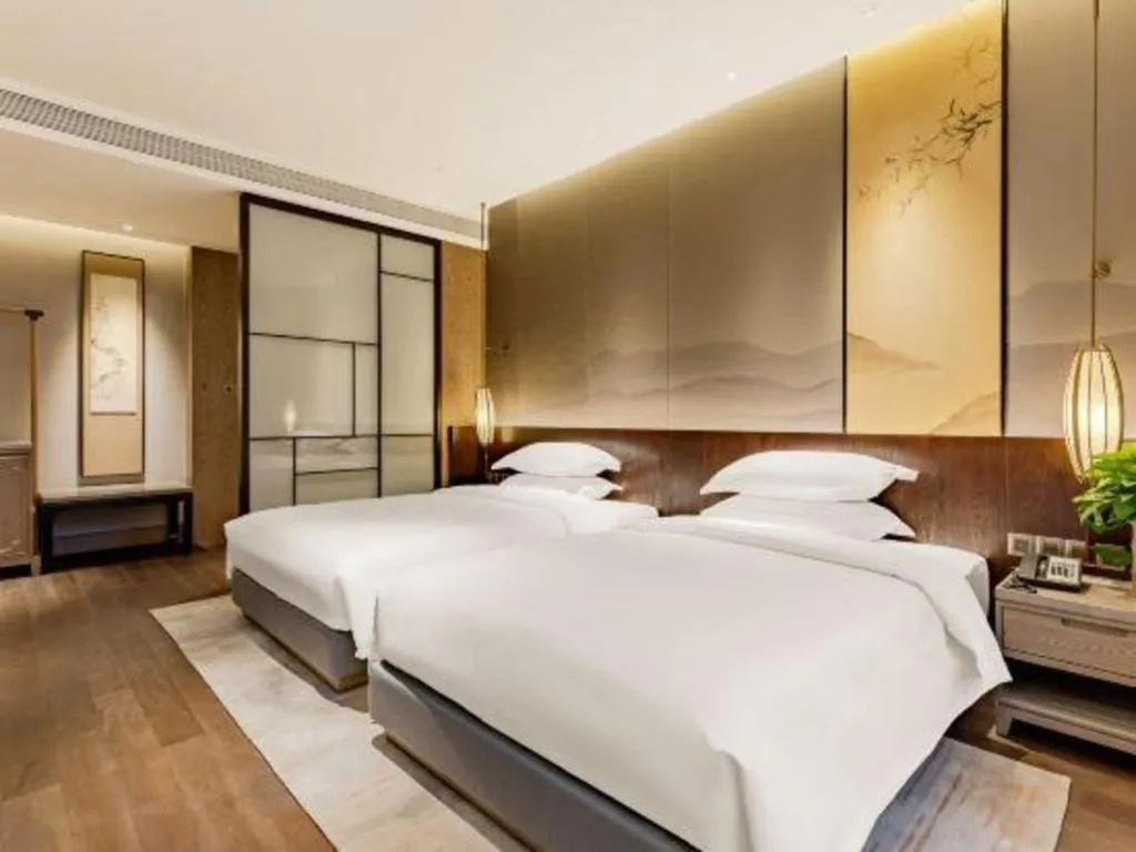 Bed in Wuxi Shanse Hotel