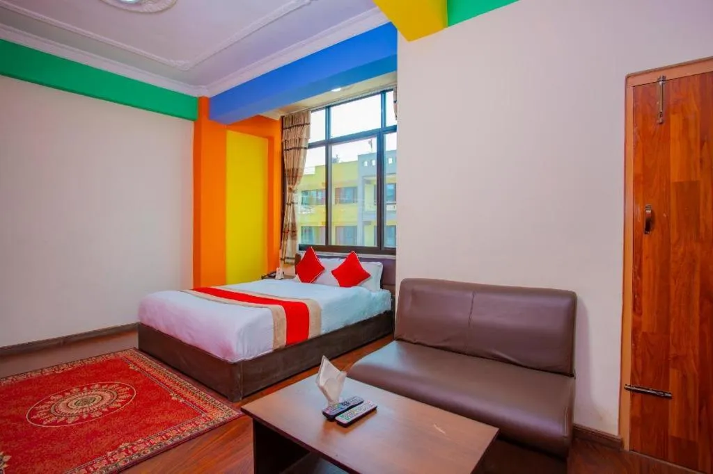 Bed in OYO 414 Hotel Om