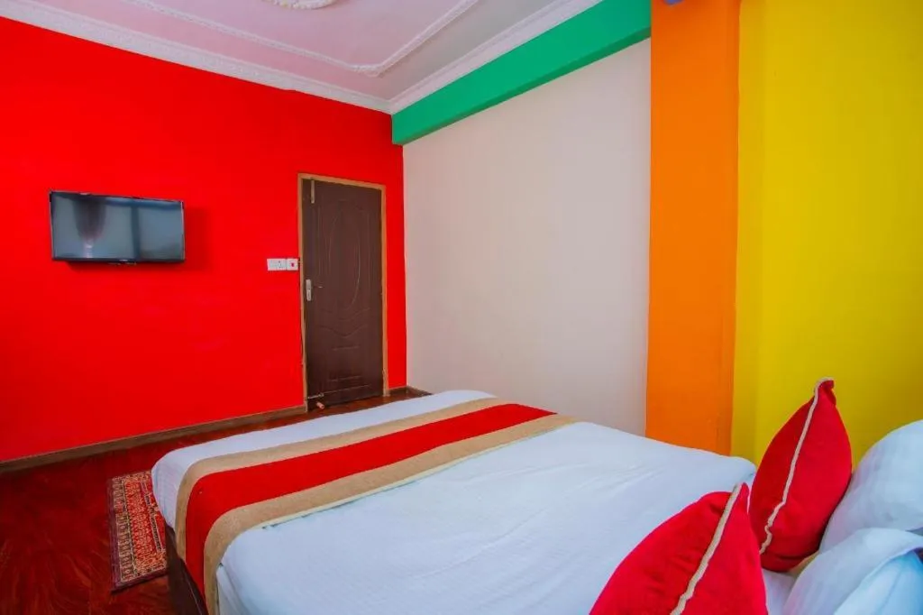 Bed in OYO 414 Hotel Om