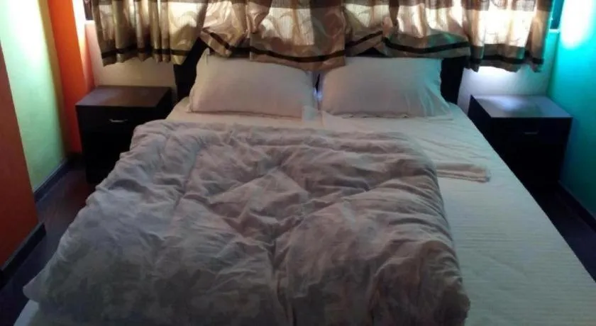 Bed in OYO 414 Hotel Om