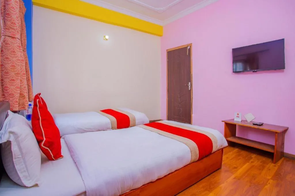 Bed in OYO 414 Hotel Om