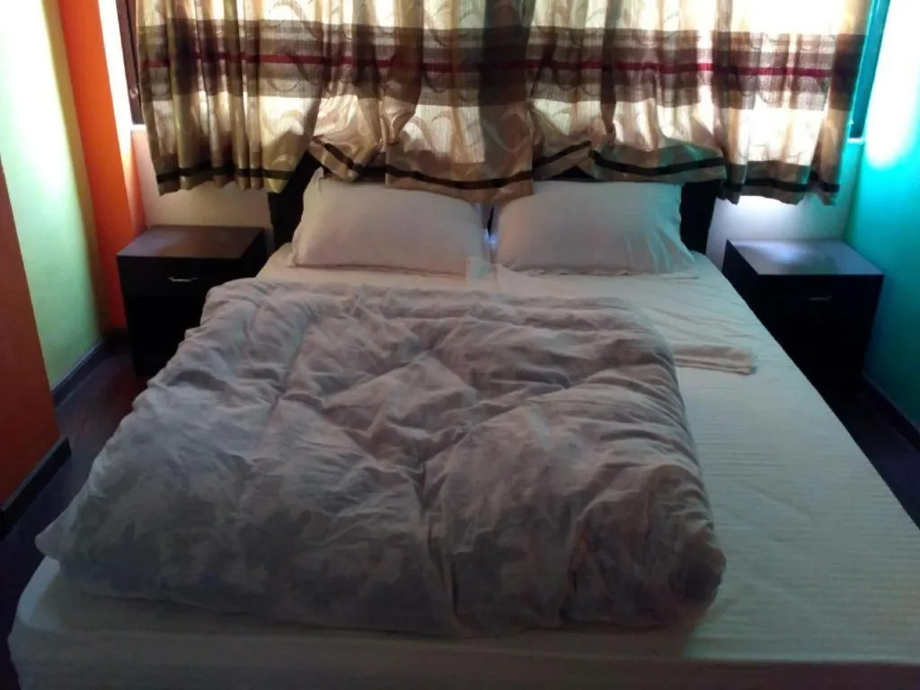 Bed in OYO 414 Hotel Om