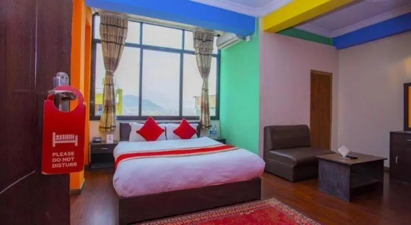 Bed in OYO 414 Hotel Om