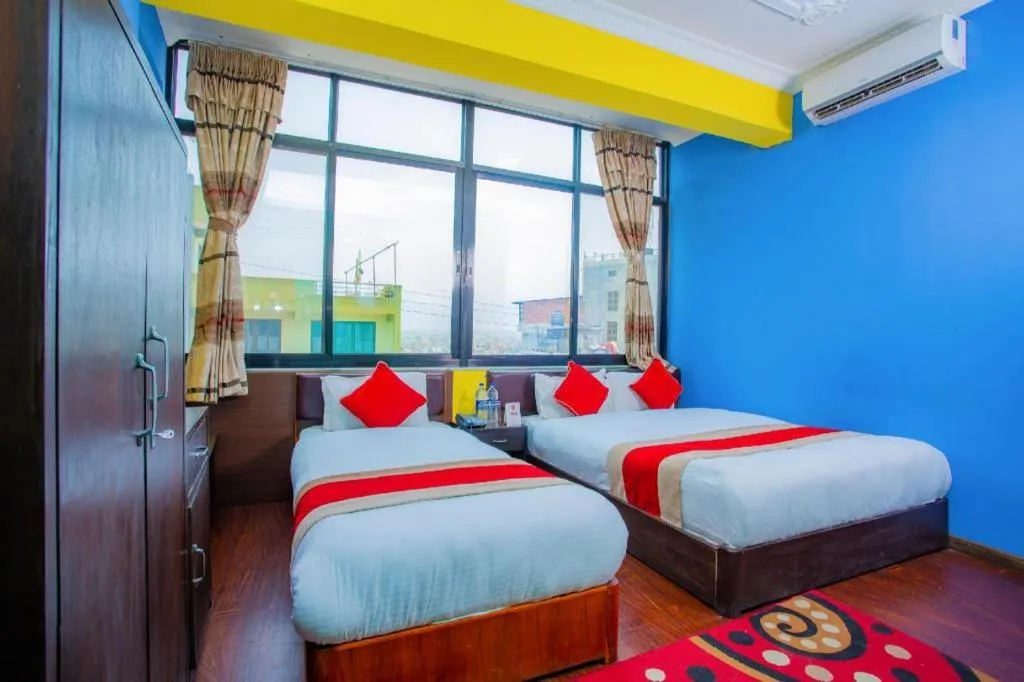 Bed in OYO 414 Hotel Om