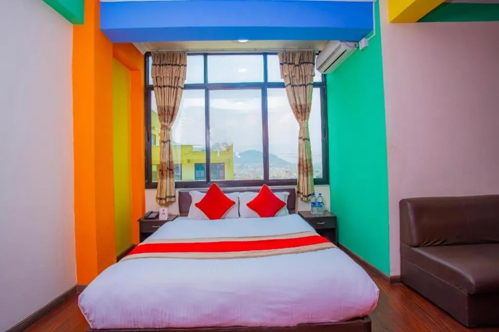 Bed in OYO 414 Hotel Om