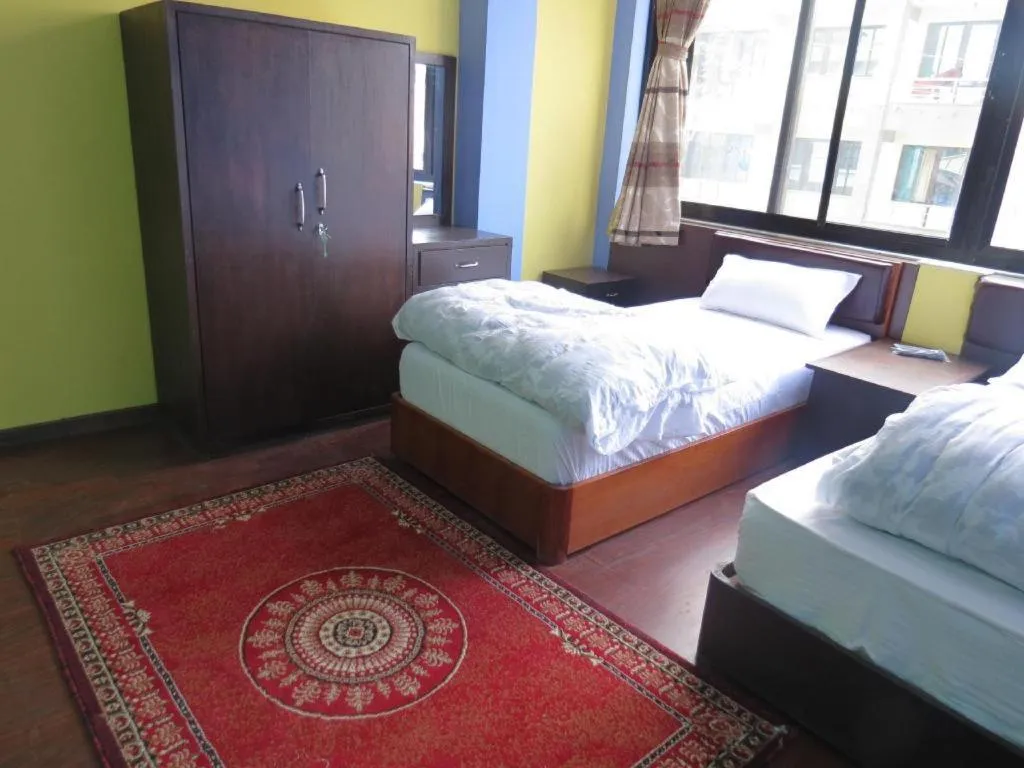 Bed in OYO 414 Hotel Om