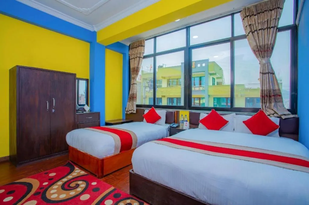 Bed in OYO 414 Hotel Om