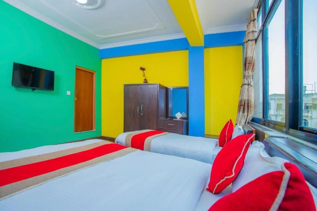 Bed in OYO 414 Hotel Om