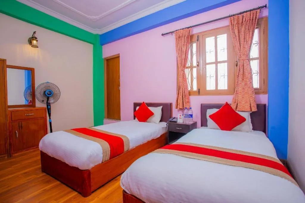 Bed in OYO 414 Hotel Om