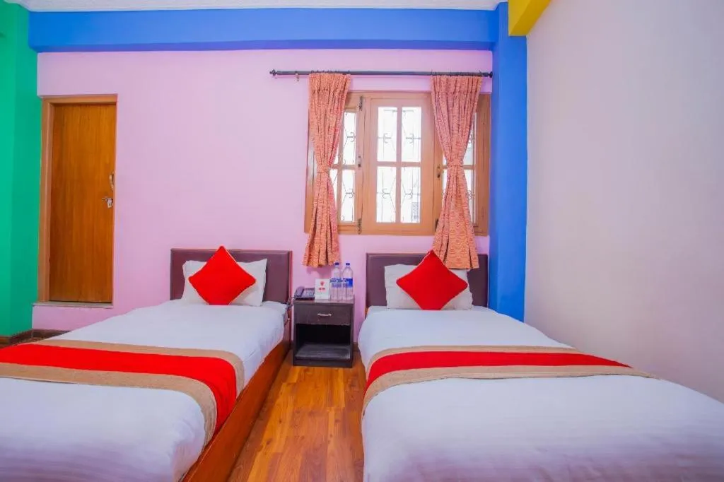 Bed in OYO 414 Hotel Om