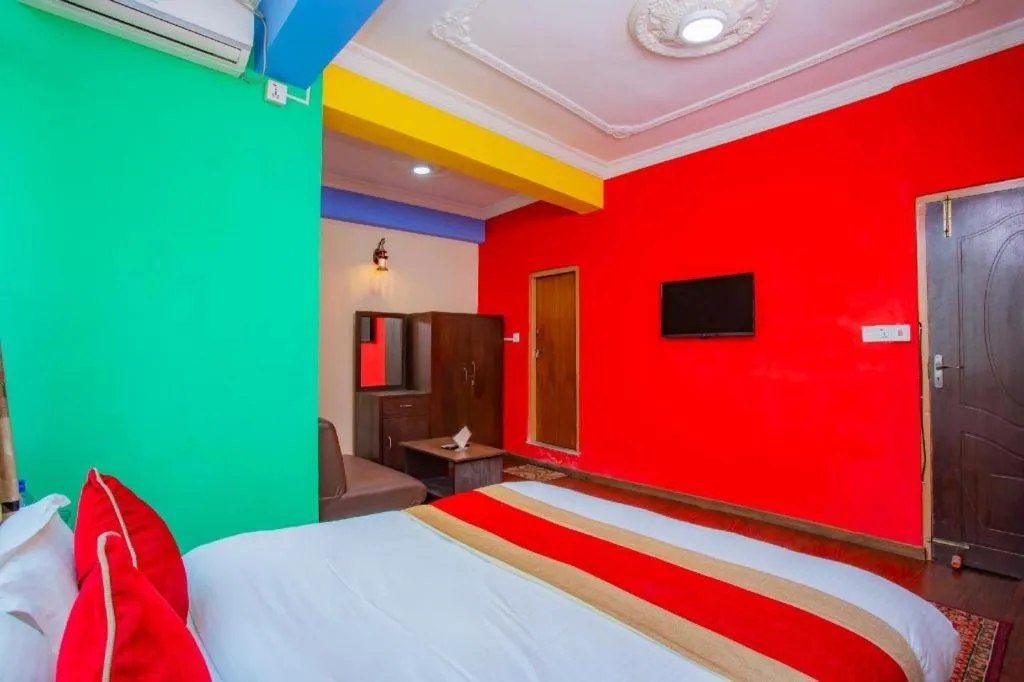 Bed in OYO 414 Hotel Om