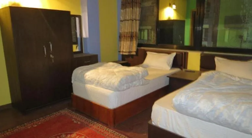 Bed in OYO 414 Hotel Om