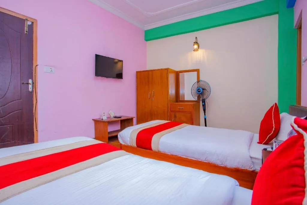 Bed in OYO 414 Hotel Om