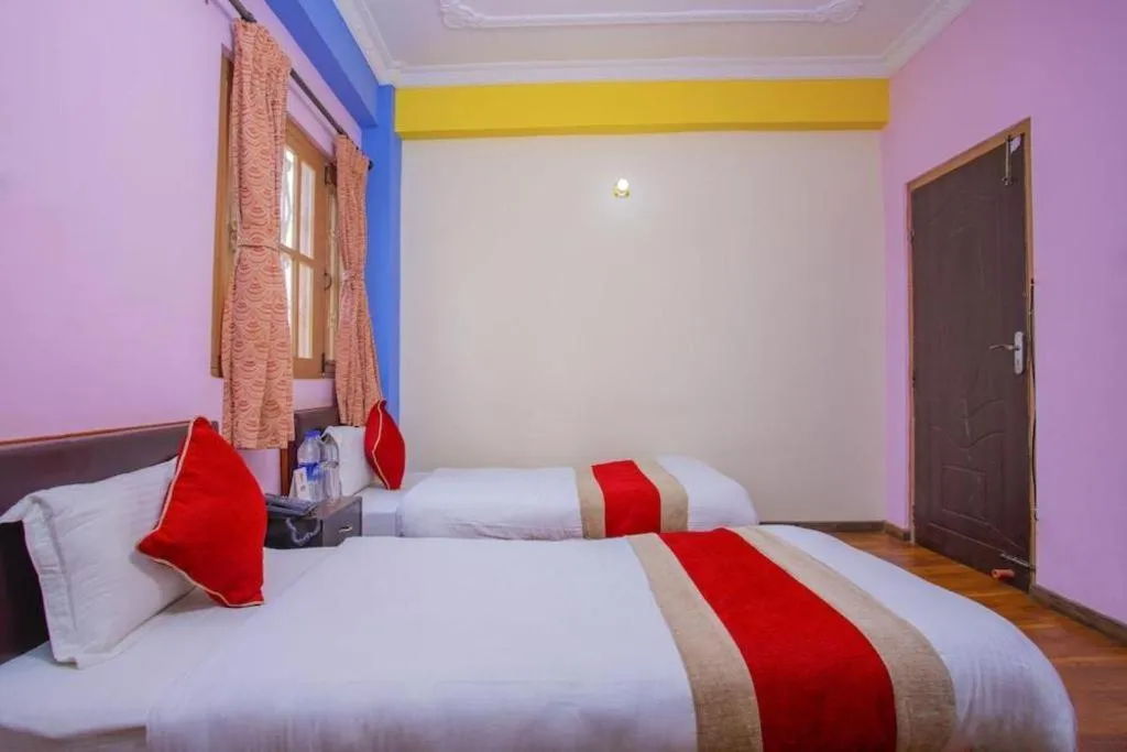 Bed in OYO 414 Hotel Om