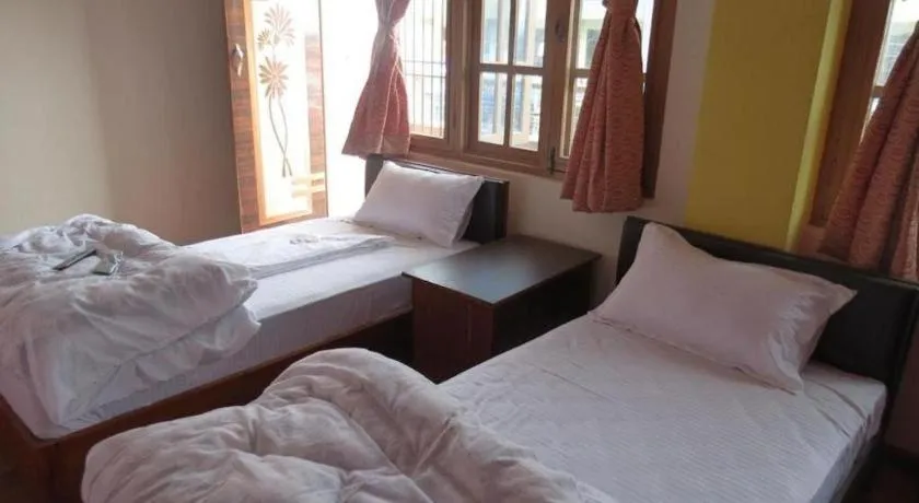 Bed in OYO 414 Hotel Om