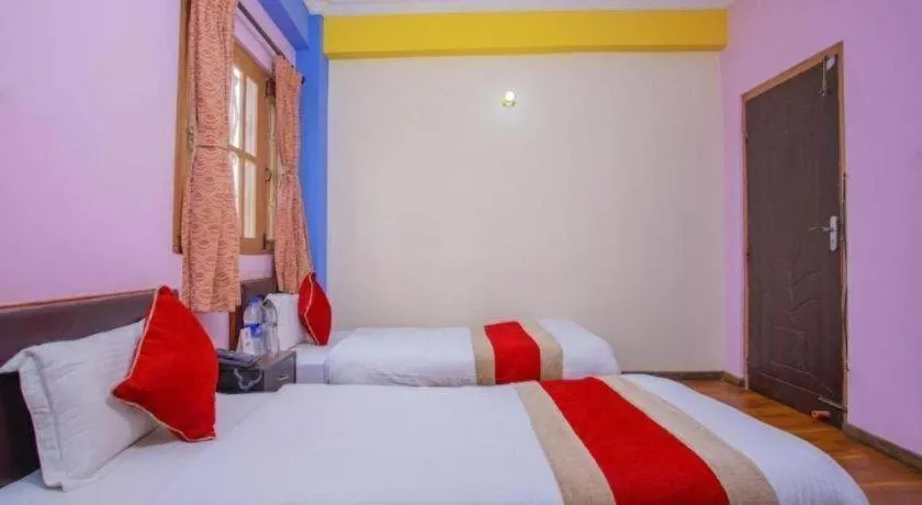 Bed in OYO 414 Hotel Om