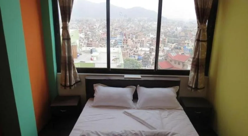 Bed in OYO 414 Hotel Om