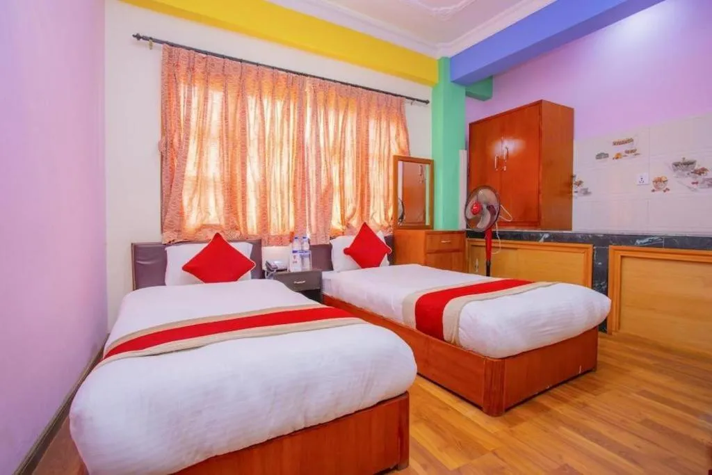 Bed in OYO 414 Hotel Om