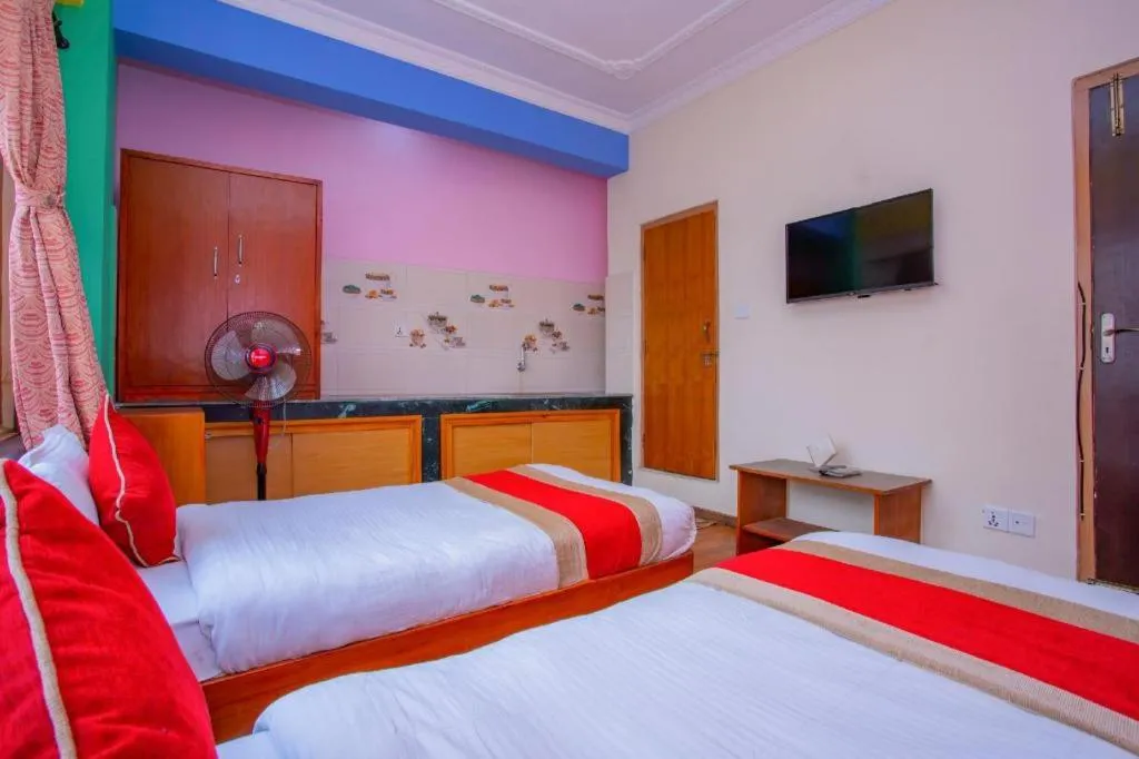Bed in OYO 414 Hotel Om