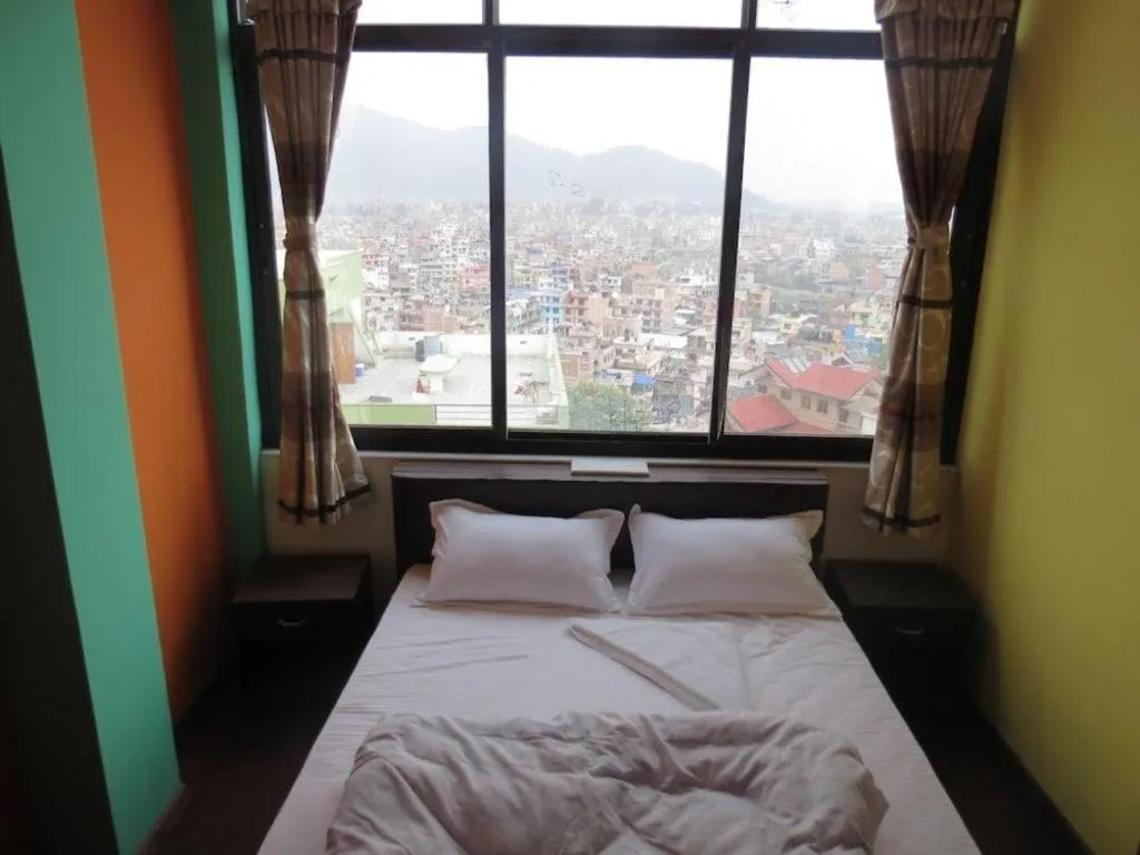 Bed in OYO 414 Hotel Om