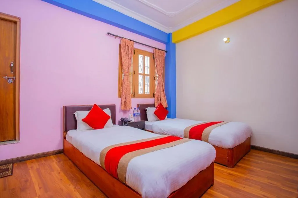 Bed in OYO 414 Hotel Om