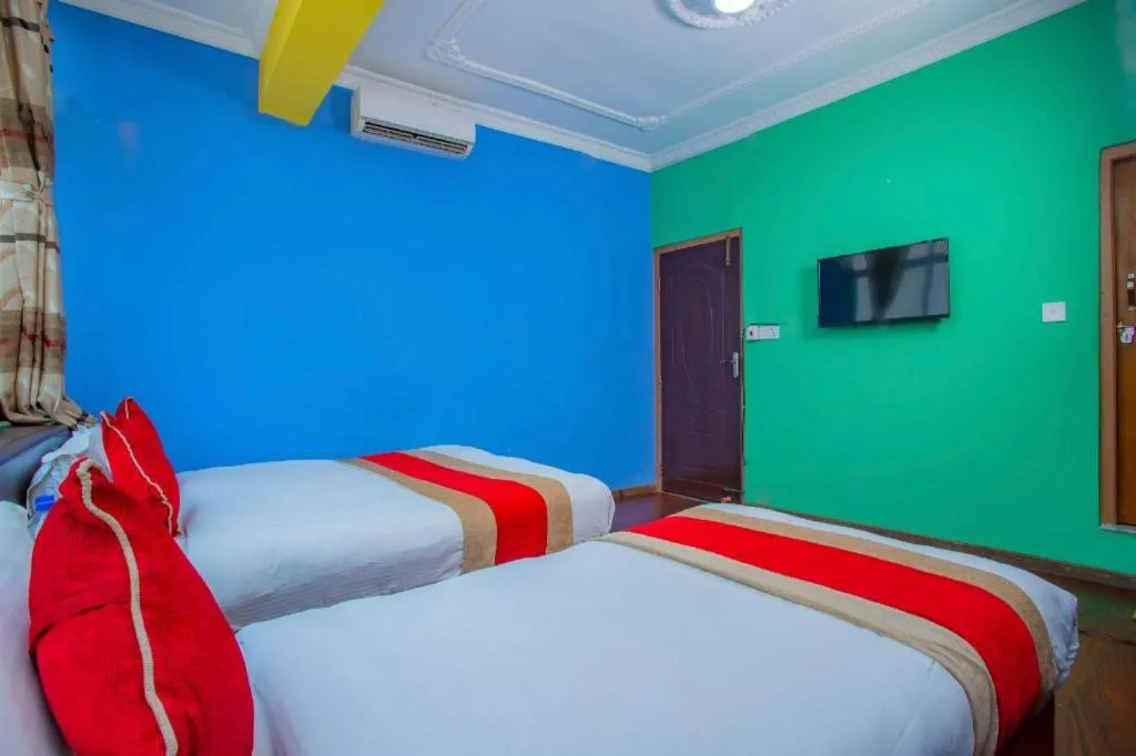 Bed in OYO 414 Hotel Om