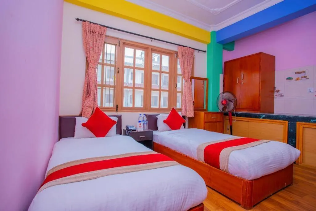 Bed in OYO 414 Hotel Om