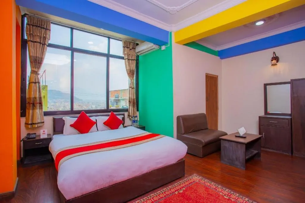 Bed in OYO 414 Hotel Om