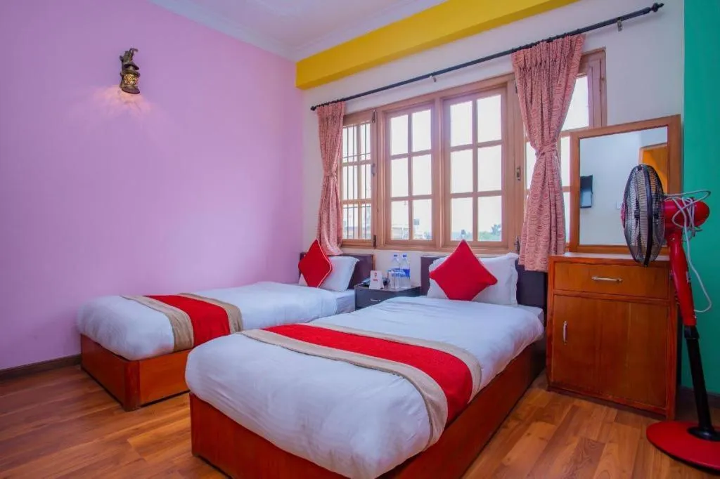 Bed in OYO 414 Hotel Om