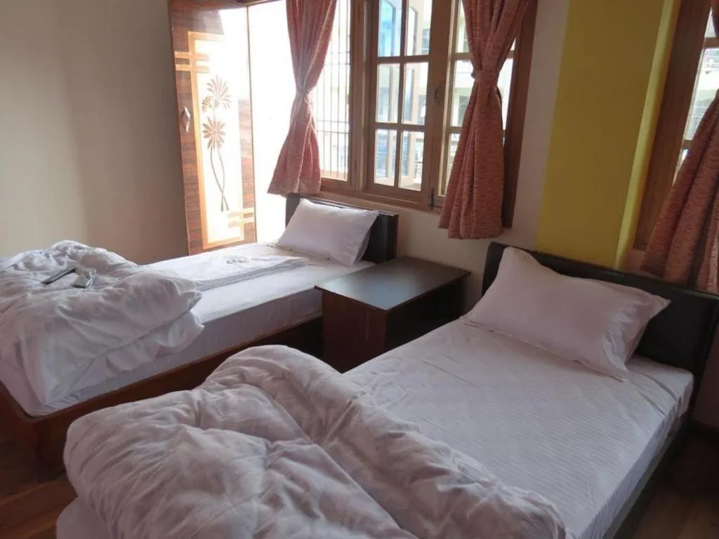 Bed in OYO 414 Hotel Om