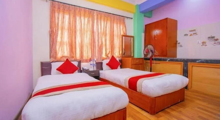 Bed in OYO 414 Hotel Om