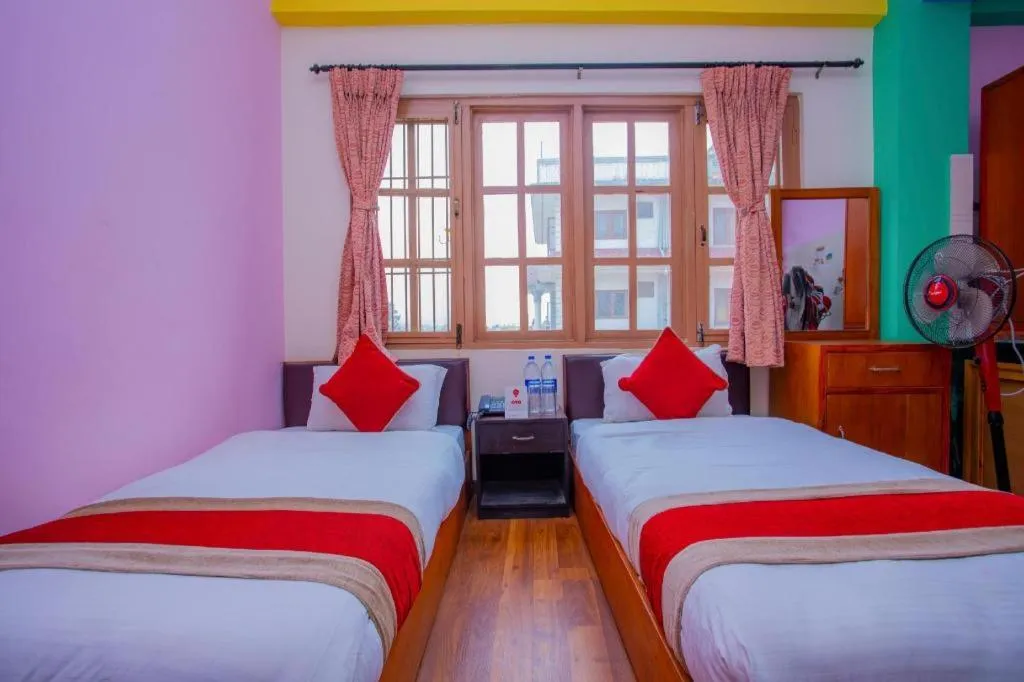 Bed in OYO 414 Hotel Om