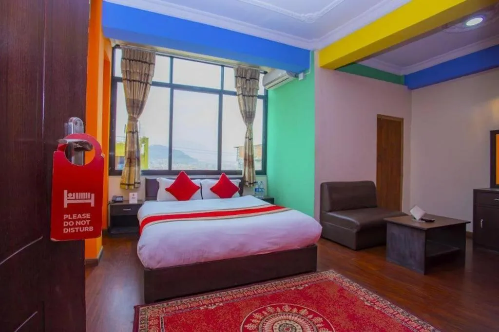 Bed in OYO 414 Hotel Om