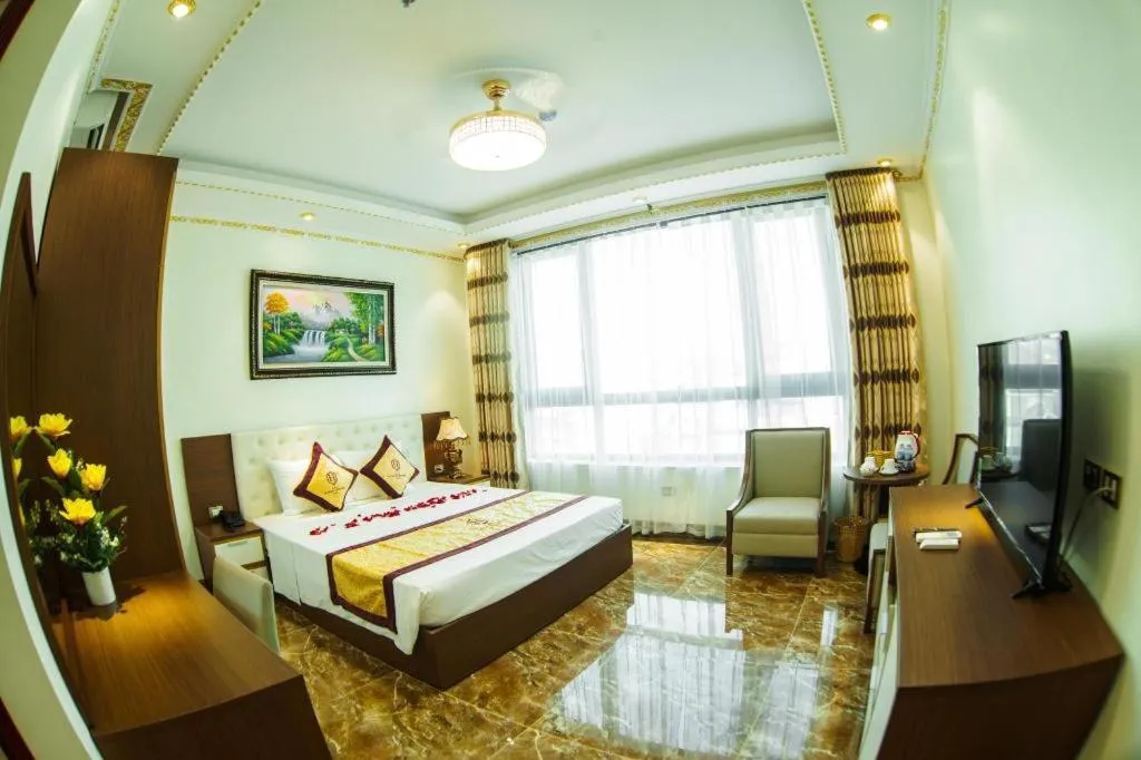 Bed in BACNINH HARMONY HOTEL