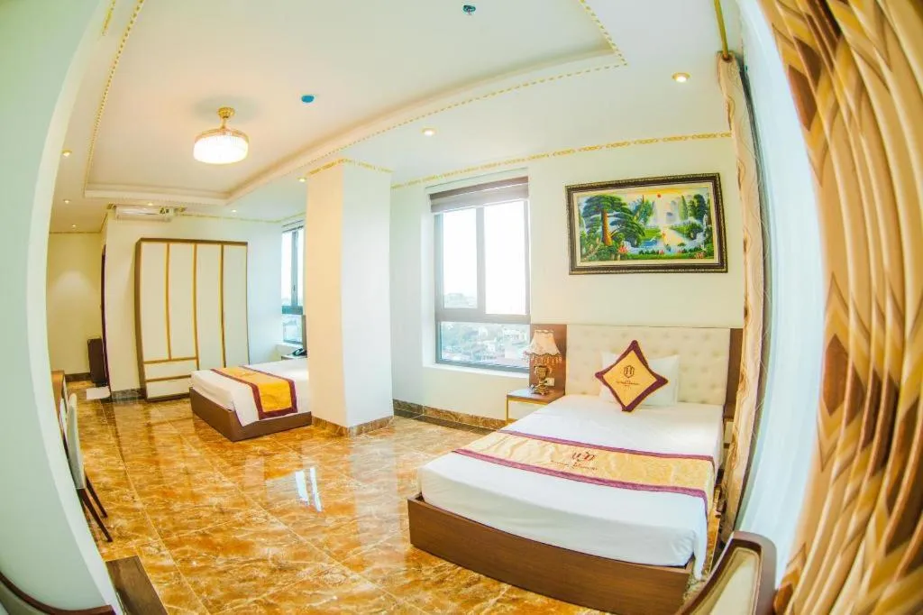 Bed in BACNINH HARMONY HOTEL